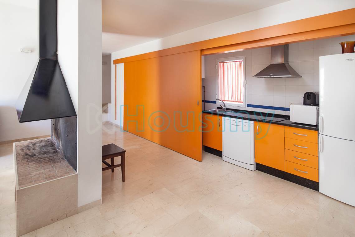 cocina-de-apartahotel Cocina de apartahotel con chimenea